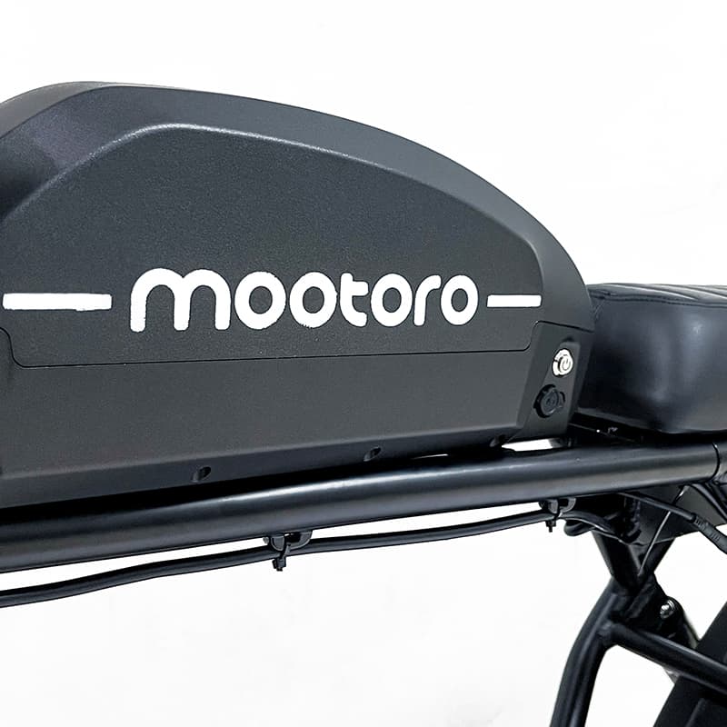 A close view of Mootoro R1 electric cafe racer's lithium battery.